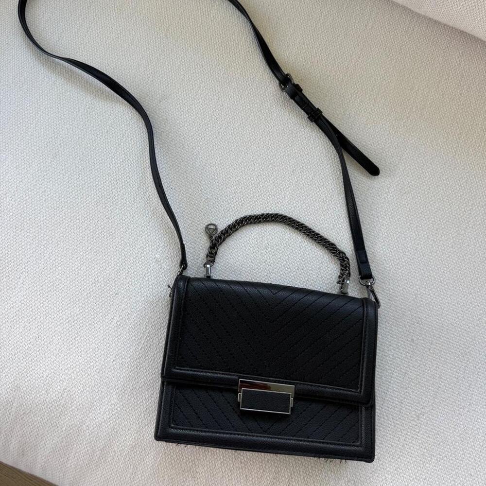 Black quilted convertible crossbody clutch